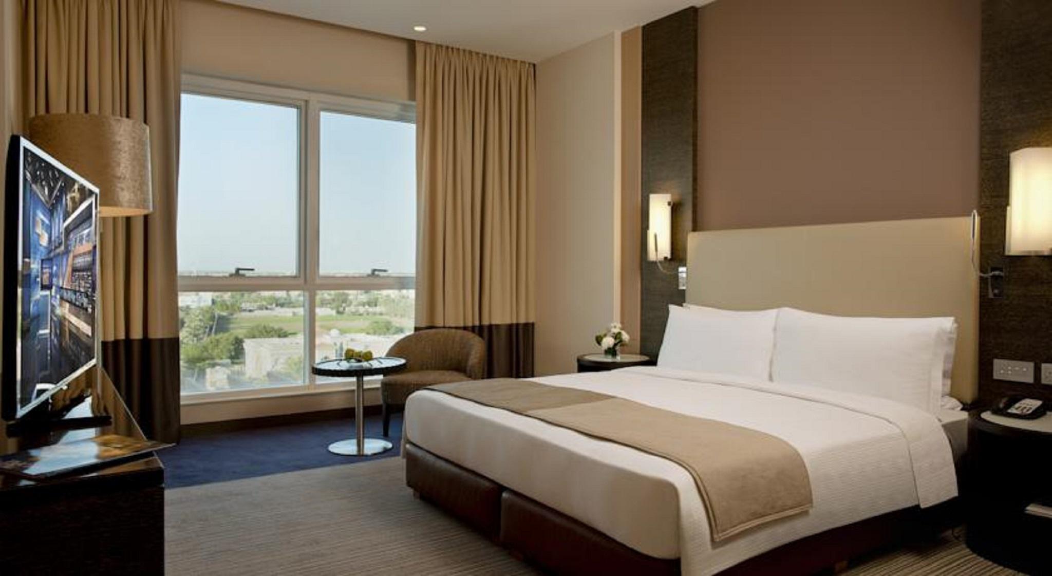 Four Points By Sheraton al-Ain Exterior foto A bedroom at the hotel